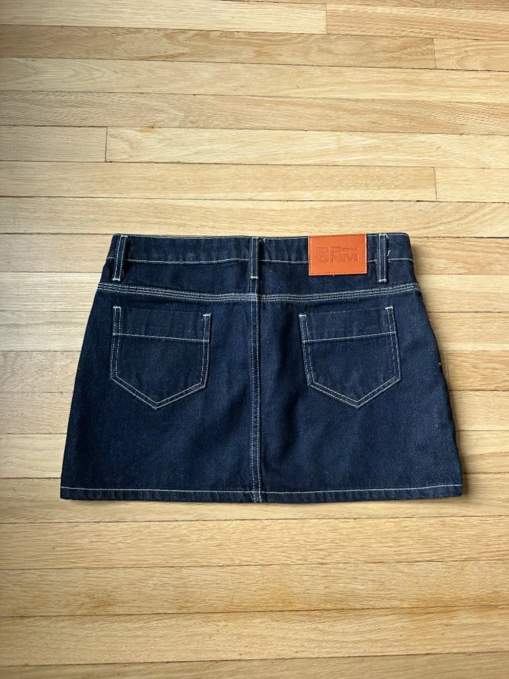 Princess Polly dark blue denim skirt